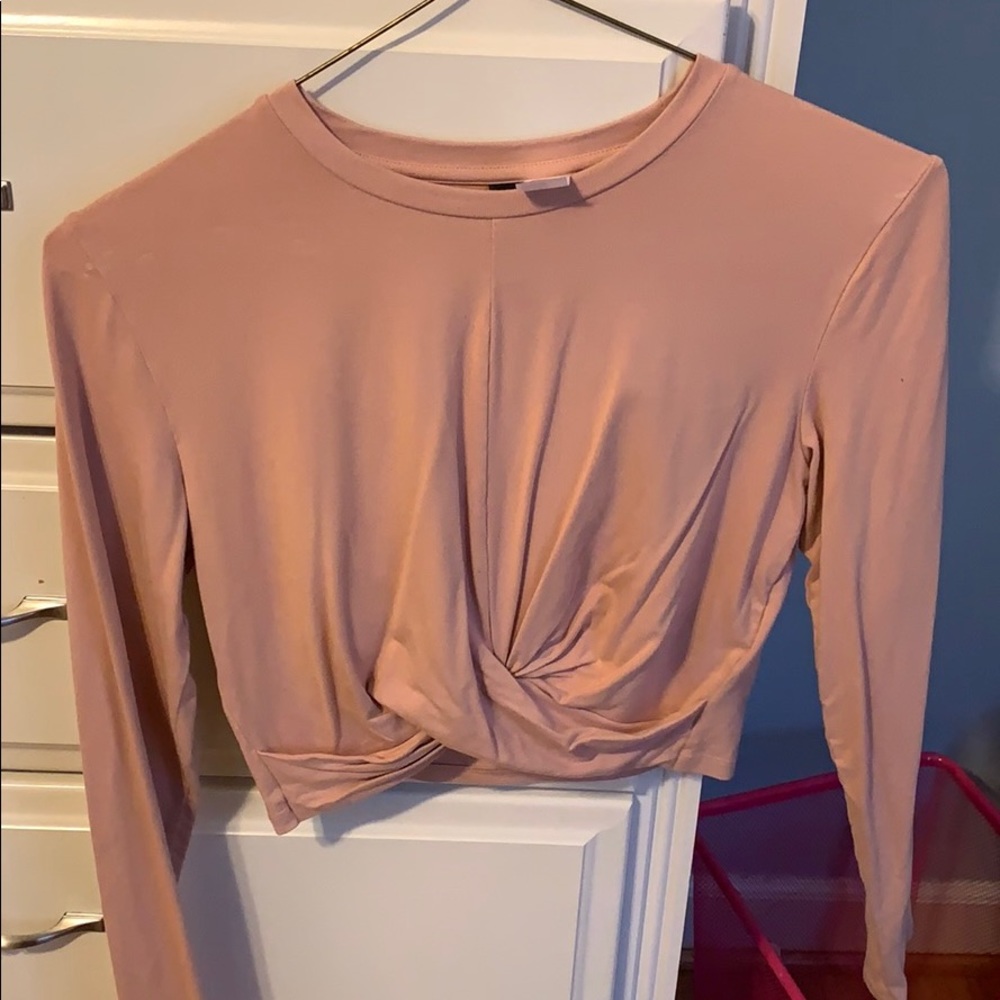 Tight cropped blush pink shirt